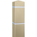 A tan Innoplast BollardGard with white reflective stripes on a square bollard.