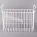 A white wire basket with a handle hanging inside a white freezer.