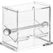 A clear acrylic container with a metal handle for Choice stirrer straws with a clear lid and two balls on top.