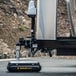 A Trailer Valet RVR9 remote-controlled trailer dolly attached to a trailer.