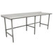 A stainless steel Advance Tabco work table with an open base.