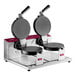 A white Estella double waffle cone maker with two round waffle irons.