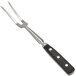 A close-up of a Winco pot fork with a black handle and silver tines.