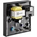 A close-up of a black rectangular AccuTemp high limit controller with a yellow button.