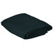 A folded hunter green cloth table cover.
