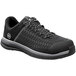 A black Timberland PRO Powerdrive athletic shoe with laces and a composite toe.