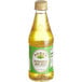 A close up of a bottle of Rose's Sweetened Lime Juice with yellow liquid and a green lid.