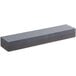 A grey rectangular carbonized silicon knife sharpening stone.