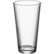 An Acopa Select mixing glass with a clear bottom.