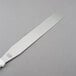 A white Tablecraft baking and icing spatula with a white handle.