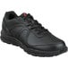 A black Reebok men's safety shoe with a red logo.