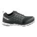 A black and gray Reebok women's athletic shoe with a soft toe and non-slip sole.