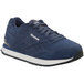 A navy blue Reebok women's athletic shoe with white accents and sole.