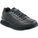 A black Reebok Harman men's athletic shoe.