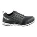 A black and gray Reebok Work Sublite men's wide athletic shoe with a soft toe and non-slip sole.