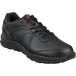 A black Reebok men's non-slip athletic shoe with a red logo.