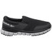 A black Reebok work slip-on shoe with a white sole.
