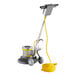A Lavex Pro floor machine with a yellow cord.