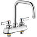 A silver Chicago Faucets deck-mounted faucet with two handles.