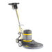 A Lavex Pro floor burnisher with a yellow and black floating handle.