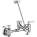 A Chicago Faucets wall-mounted sink faucet with chrome finish and two handles.