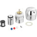 A Chicago Faucets MVP metering push handle retrofit kit with metal parts.