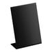 A black tabletop chalkboard sign with a slanted design for display.