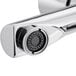 A close-up of a Chicago Faucets deck-mounted metering sink faucet with a chrome finish.