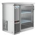 An Avantco stainless steel back bar refrigerator with a glass door.