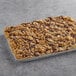 A half sheet pan of chocolate German crumb cake with chocolate chips on top.