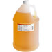 A jug of LorAnn Oils Cake Batter Super Strength Flavor with orange liquid.