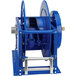 A blue Coxreels V Series hose reel with silver handles.