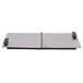 A rectangular stainless steel lid with black handles.
