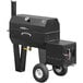 A black Meadow Creek SQ36 barbecue smoker on wheels.