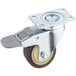 A metal Estella brake caster with a rubber wheel.