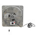 A Canarm shutter-mounted exhaust fan with wires attached.