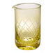 A yellow Barfly stirring glass with a diamond pattern.