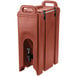A brown plastic Cambro insulated beverage dispenser with a black handle and lid.