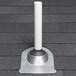 A white Oatey roof flashing around a white pipe on a roof.