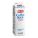 A white carton of Rich's Coffee Rich Non-Dairy Creamer on a counter.