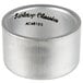 A silver Tabletop Classics by Walco round polypropylene napkin ring with black text reading "AC-6512S"