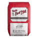 A 25-pound bag of Bob's Red Mill Organic Golden Masa Harina corn flour.