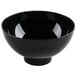 A close up of a Fineline black plastic tiny bowl.