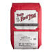 A 25-pound bag of Bob's Red Mill Organic Whole Grain Corn Flour.
