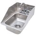 A stainless steel Advance Tabco drop-in sink with a faucet.