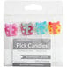A package of 4 Creative Converting present-shaped birthday candles.