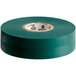 A roll of green Scotch vinyl electrical tape with a white label.