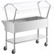 A stainless steel ServIt cold food table with clear top covers.