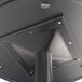 A close up of a black metal Lancaster Table top with screws.