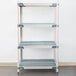 A white MetroMax metal shelf with open grid shelves.